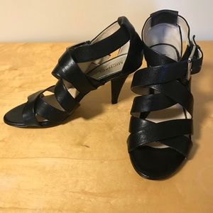 Black leather heels with ankle strap